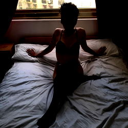 Female Model in Lingerie on Bed