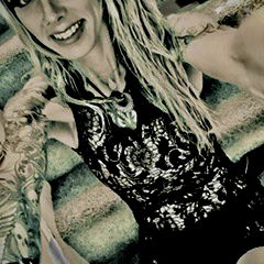 Metal Momma: The Elegant Tattooed Model