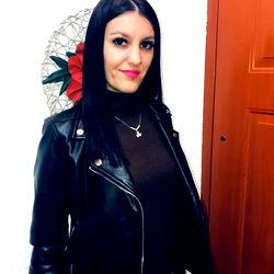 Fashionable Adriana in Chic Leather Jacket