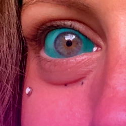 Vibrant Makeup and Tattoo: A Fierce Transformation