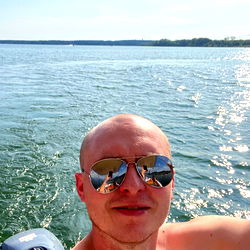 A Man Relaxing on a Boat