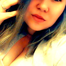 Angela Gilles, a young and talented model with striking blue hair