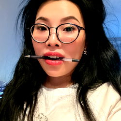 Young Asian Woman in a Glasses Advertisement
