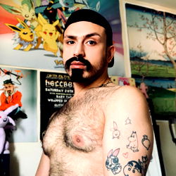 Tattooed Avess Poses for OnlyFans