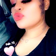 Smiling Allysha R. captures a candid moment in her OnlyFans profile.