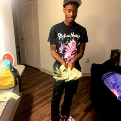 Young Man with Money in His Hand, 21st Century Casual Attire