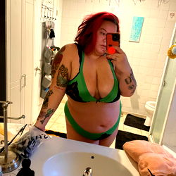 Model in a Bathing Suit Taking a Selfie