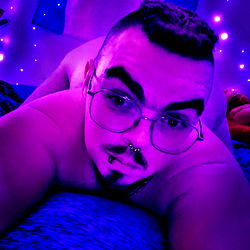 Meowgan Fleaman, a young adult male in a purple room.