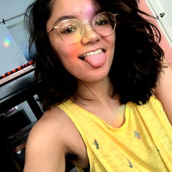 Stylish Lady with Short Hair and Yellow Shirt