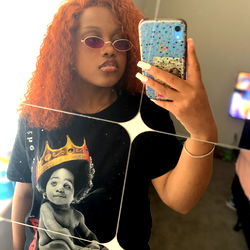 Kya, Onlyfans Model with Red Hair and Purple Sunglasses Posing in a Mirror Selfie