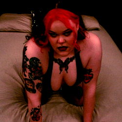 Model with Tattoos and Piercings in a Lingerie Shoot