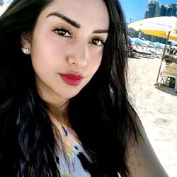 Beautiful Woman Smiling at Beach
