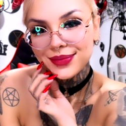 Tattooed Female Model with Red Hair and Tattoos