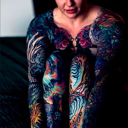 Tattooed Model Texie James Poses with a Professional Attitude