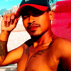 Alves MP, a model and influencer from Rio de Janeiro sharing his time on the beach