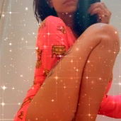 Nikki, the alluring OnlyFans model, exudes confidence and sensuality in her latest photoshoot. In this captivating image, Nikki is seen striking a pose on a white surface, radiating an air of mystery and intrigue.