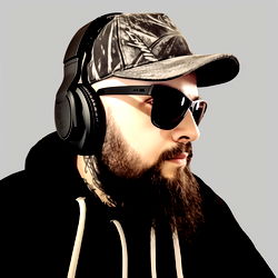 AxleDG, Australian Beard-Having DJ, in Studio with Headphones