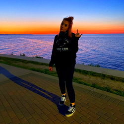 🌅 Sunset Selfie with Cityscape in Background