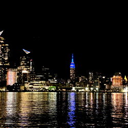 Nightscape of a Riverfront City Skyline