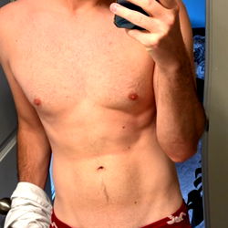 Shirtless Man Taking Mirror Selfie