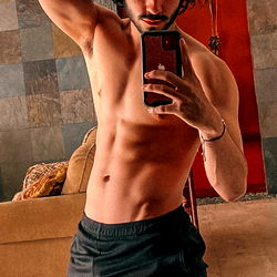 Andre, Ecuadorian OnlyFans Model Posing in Gym Gear, Showcasing Fitness and Physique