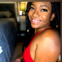 Zia Mello, OnlyFans Model Smiling in Red Lingerie