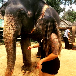 Model Heaven Interacting with Elephant