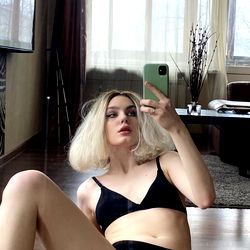 Model in Stylish Lingerie Captured in Modern Living Room