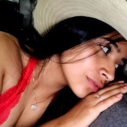 Stylish Woman in Floral Hat and Red Bra