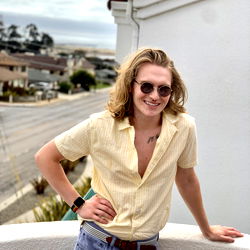 A Casually Styled Model in a Crop Top and Pants