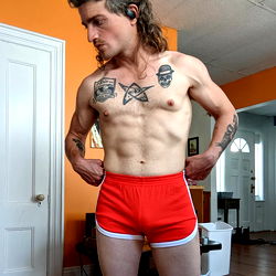 Fitness Enthusiast in Boxer Shorts and Tattoos