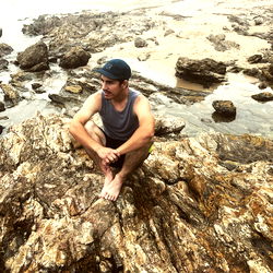 A California native posing near the ocean