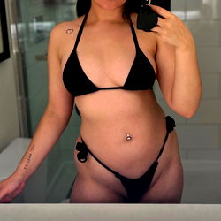 Alluring Female Model in Black Bikini