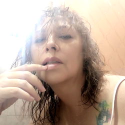 Mexican Model Patt in a Bathroom Mirror