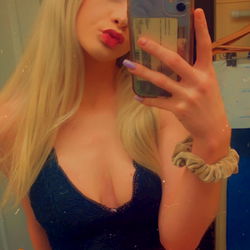 Lana - OnlyFans Model in Racy Lingerie Posing for Phone Camera