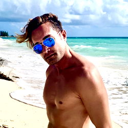 Adickted Model Posing for Photoshoot on Beach