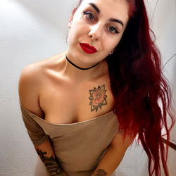 Red-headed model in a revealing outfit