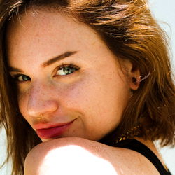 Beautiful Woman with Long Hair and Earrings