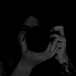 Mysterious Photographer Capturing the Moment