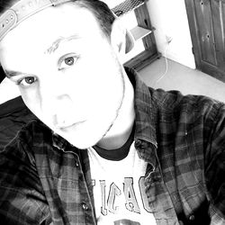 Model Jack's Stylish Portrait with Plaid Shirt