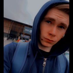 An Instantaneous, Unassuming Portrait of Aidan West, a British Model with a Mysterious Expression