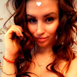 A beautiful woman posing for the camera