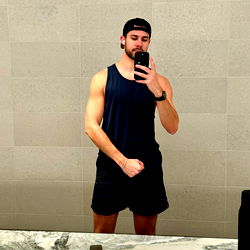 Fitness enthusiast posing in gym