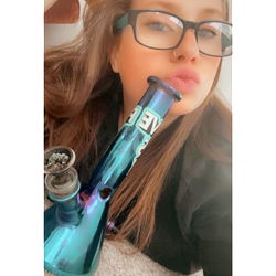 Model Kelly's Playful Pose with Vape and Cat