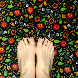 An OnlyFans Model's Feet with Creative Patterned Toes