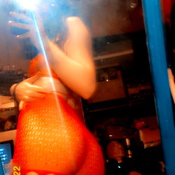 Amber Douglas in a Red and Black Fishnet Lingerie