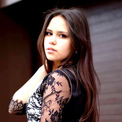 A young woman poses with confidence