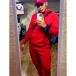 Fitness Model Andy Cohen in Red Tracksuit