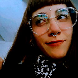 Stylish Individual in Unique Accessories and Trendy Eyewear