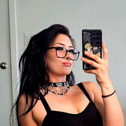 Sensual Fashion Model Posing with Selfie Stick